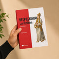 Person holding Deep Learning with Python, Second Edition by Francois Chollet – Manning paperback in hand